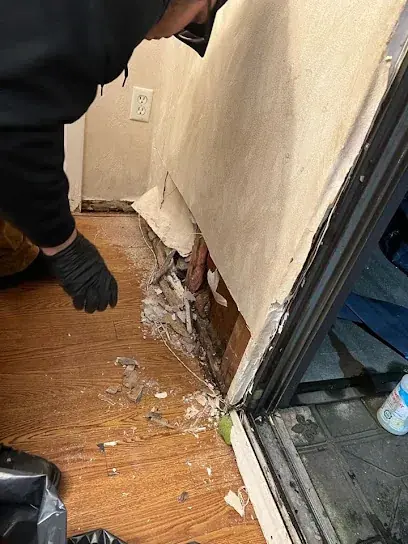 Water damaged baseboard and flooring removed in Brooklyn