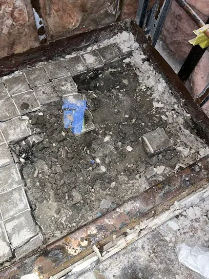 Water damaged tile floor removed in a Brooklyn home