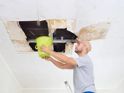 Ceiling water damage being opened up in a Brooklyn home